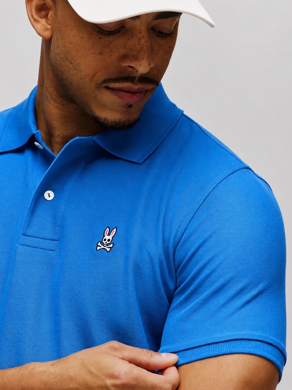 Psycho Bunny Blue Short-Sleeve Pique Polo with Bunny Skull Logo Sz 7, guc